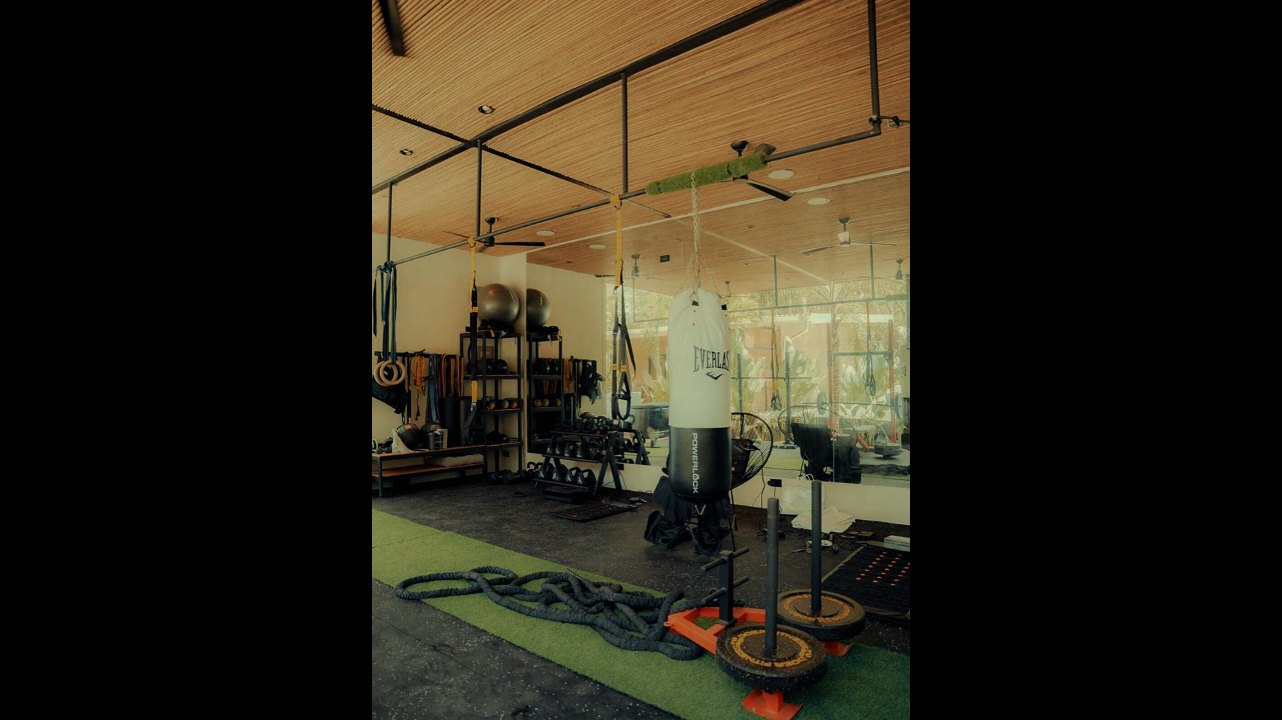 Free weights, rings, battle ropes and a sled in the gym at re:center, Santa Teresa, Costa Rica